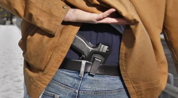 A concealed handgun in a holster